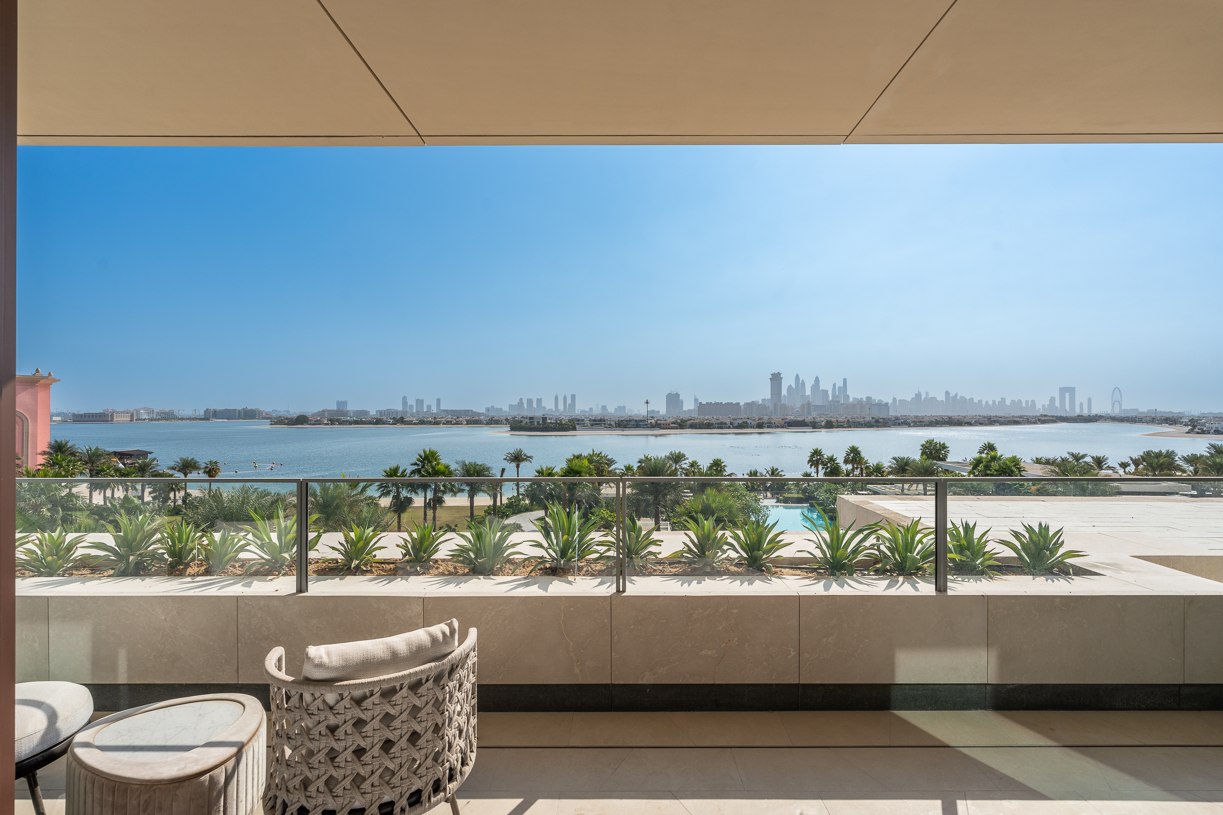 Upgraded 2-Bedroom Apartment with Palm Views