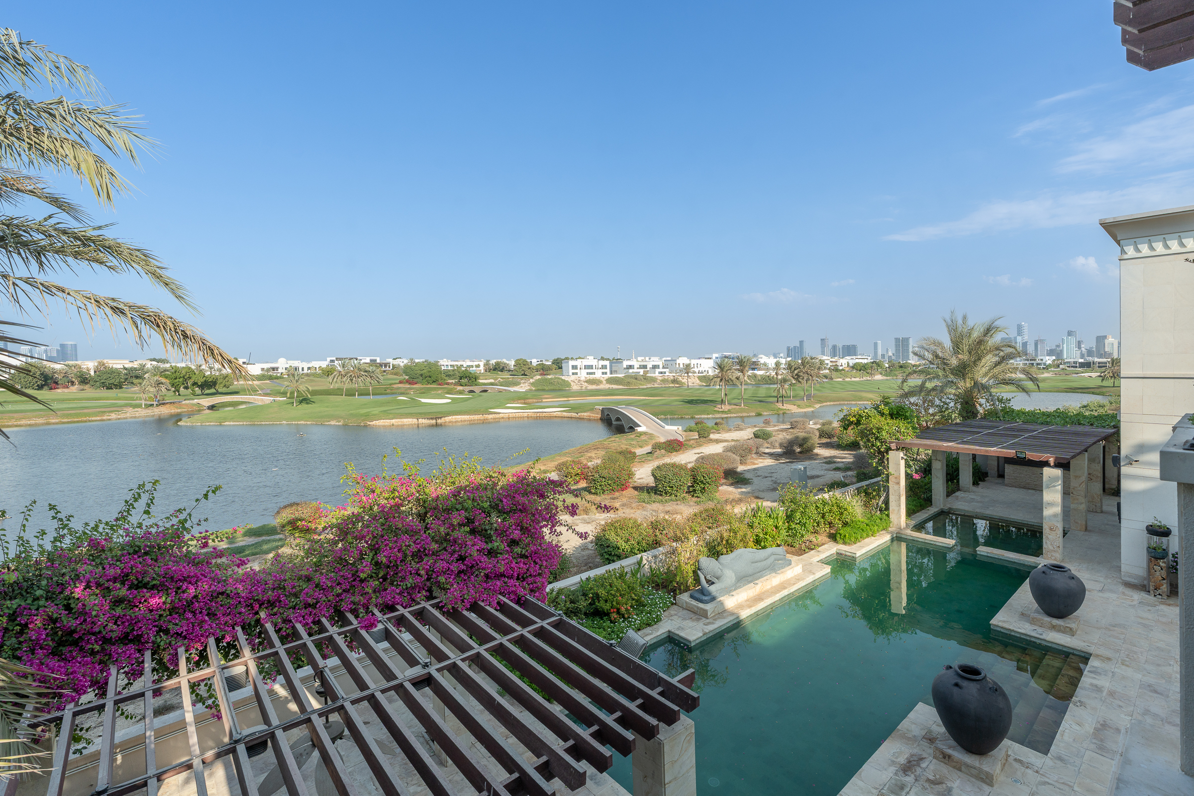 Emirates Hills lake golf course and villa landscape Dubai
