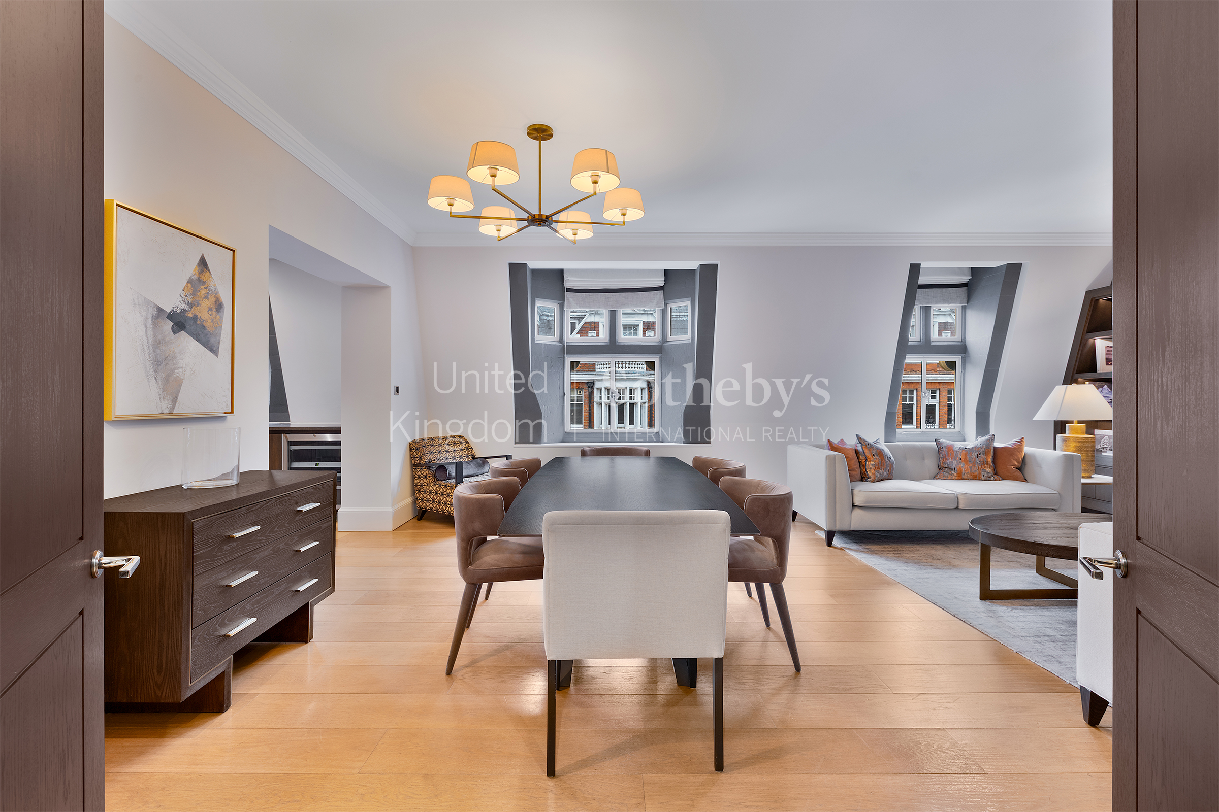 A refined three-bedroom apartment with private balconies in the heart of Mayfair