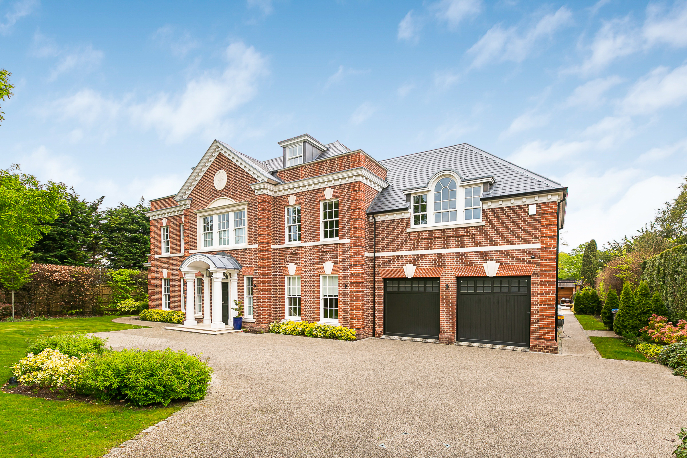 Stunning family home with private swimming pool for sale in Oxshott